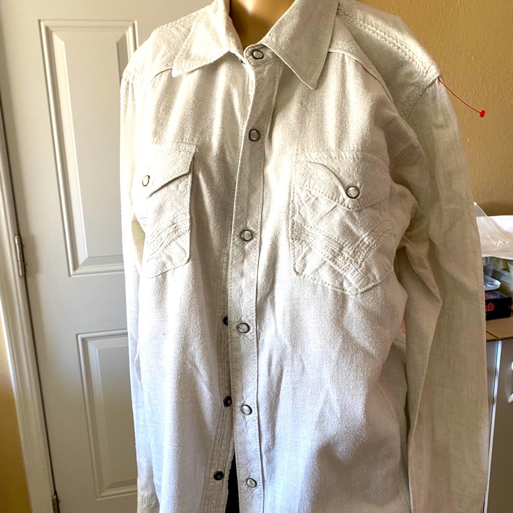 Buckle Black shirt. Long sleeves. Still Like new.